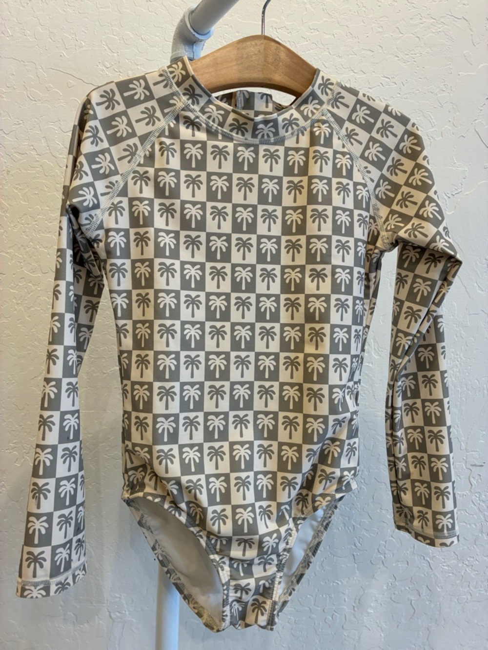 Rylee + Cru Kids One-Piece Rash Guard Swimsuit in Gray and Cream Palm Print
